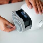 Compact and portable design lets you take it anywhere - The Airblo portable air cooler is designed to be small and lightweight, making it easy to take with you wherever you go. Whether you're traveling, working in the office, or lounging at home, you can enjoy the benefits of cool, refreshing air without the hassle of a bulky air conditioning unit. Measuring just 7 inches in height and 9 inches in width, our air cooler can fit easily on a desk or tabletop, and its sleek design won't clash with your decor. And when it's time to hit the road, simply slip it into your bag or backpack and you're good to go!