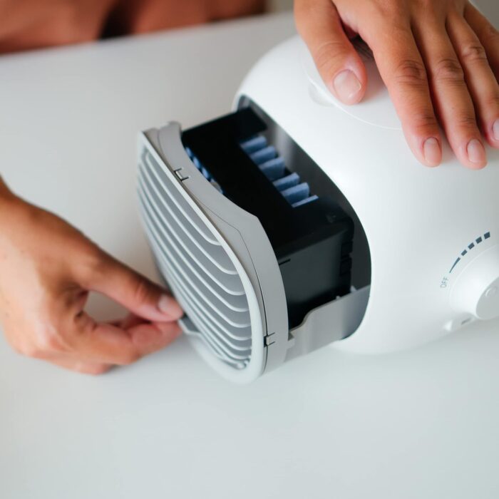 Compact and portable design lets you take it anywhere - The Airblo portable air cooler is designed to be small and lightweight, making it easy to take with you wherever you go. Whether you're traveling, working in the office, or lounging at home, you can enjoy the benefits of cool, refreshing air without the hassle of a bulky air conditioning unit. Measuring just 7 inches in height and 9 inches in width, our air cooler can fit easily on a desk or tabletop, and its sleek design won't clash with your decor. And when it's time to hit the road, simply slip it into your bag or backpack and you're good to go!