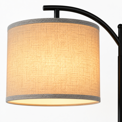 Close up of arc floor lamp linen drum shade with grey trim