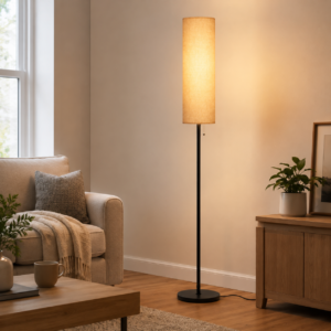 Modern linen floor lamp beside armchair in living room