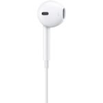 Close-up of Apple EarPods USB-C left earbud showing L label and oval mesh speaker grille, UK