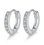 Detailed view of round zircon-studded silver hoop earrings