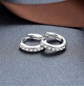 Close-up of sterling silver zircon hoop earrings pair
