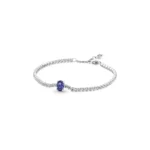 Silver tennis bracelet with blue oval centre stone and clear sparkling crystals