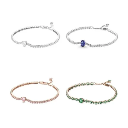 Collection of four sparkling tennis bracelets in silver, blue, rose gold pink and green